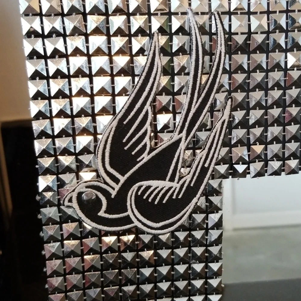 Modern studded wall mirror